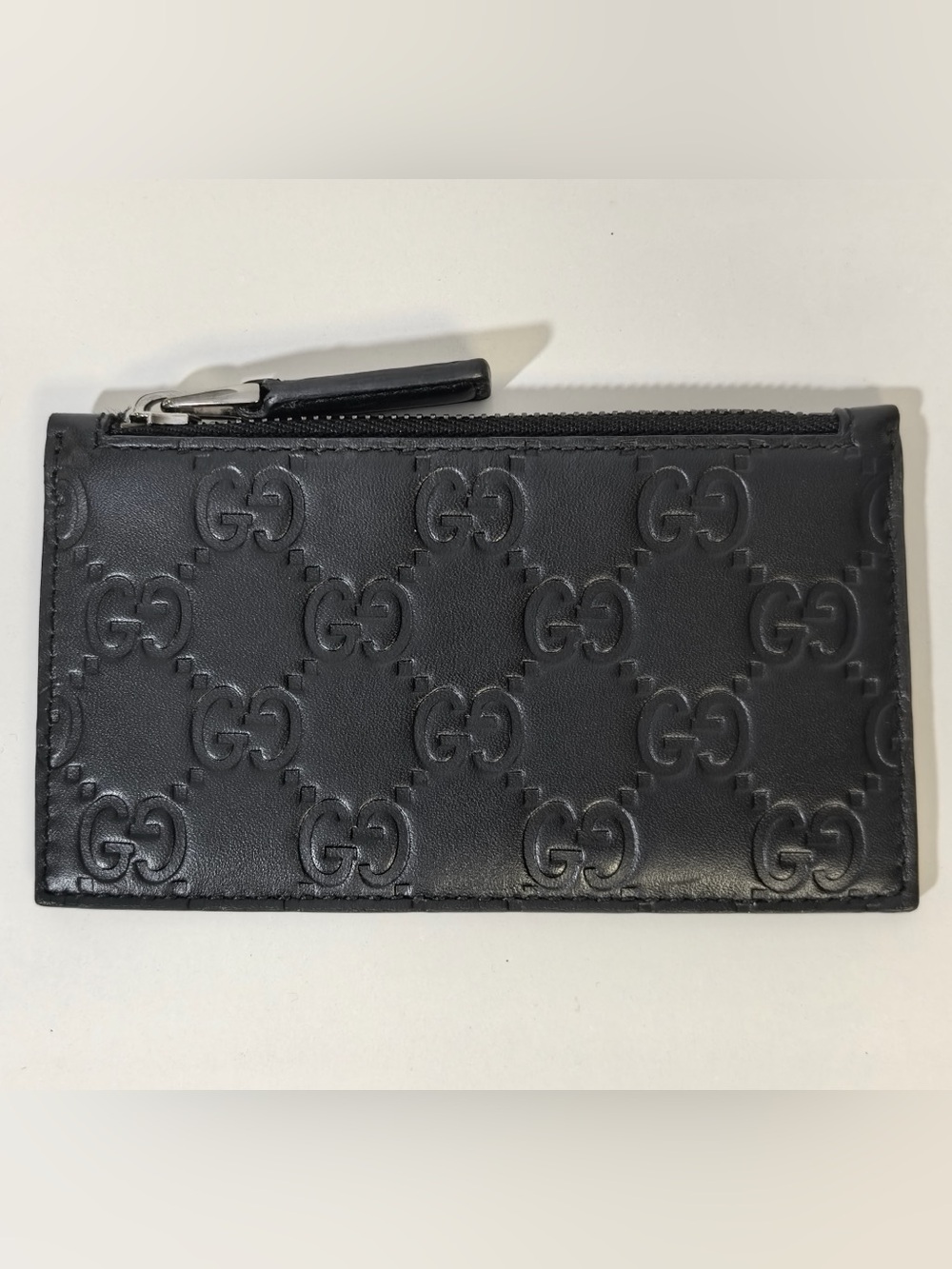 Pre-Owned Gucci GG Embossed Black Leather Zip Cardholder